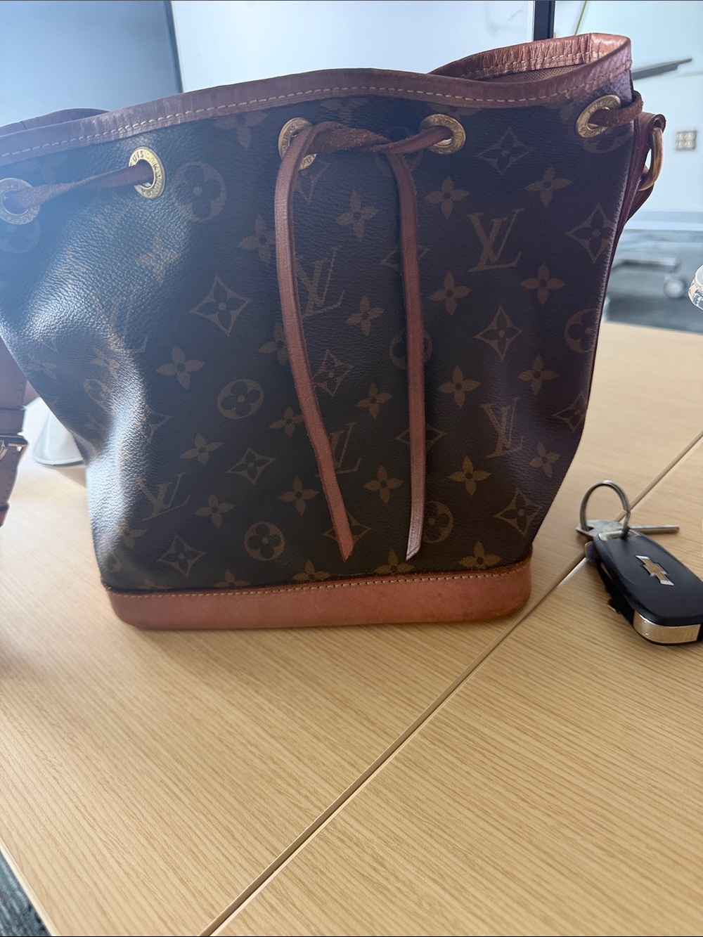 Louis Vuitton Monogram Drawstring Tote in Brown & Tan